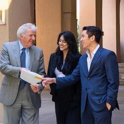 School of Business professor and 2 students