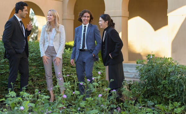 4 graduate students at Anderson Hall, UCR School of Business