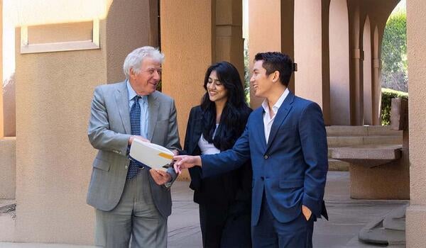 School of Business professor and 2 students